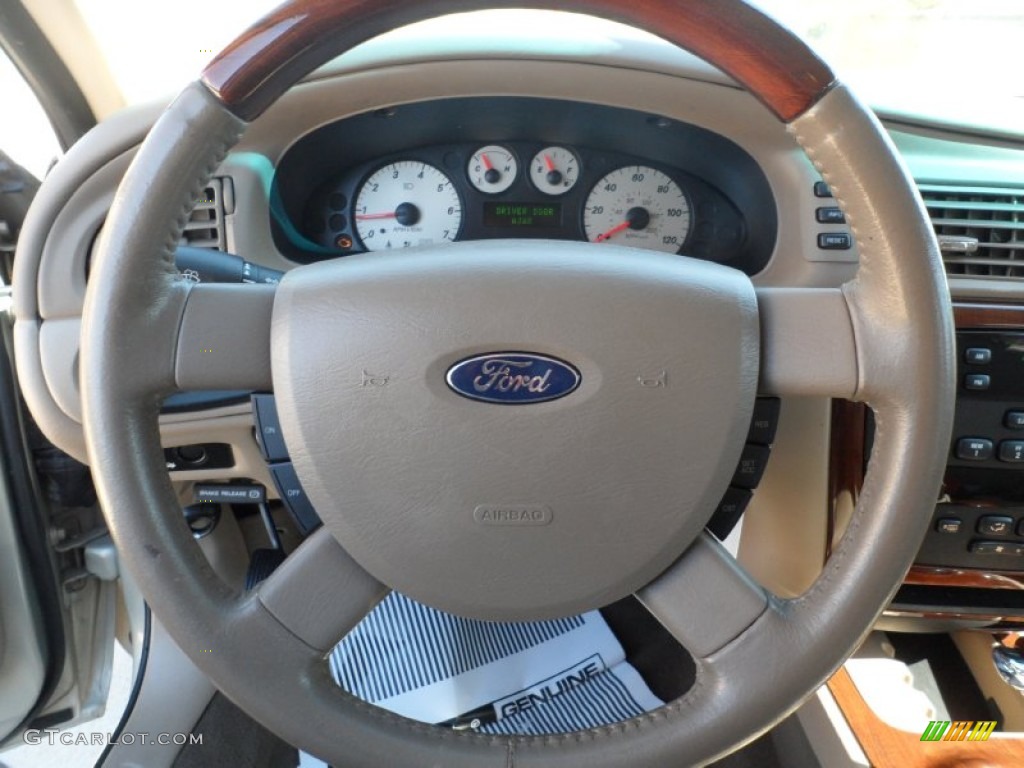 2005 Ford Taurus SEL Medium/Dark Pebble Steering Wheel Photo #53834719