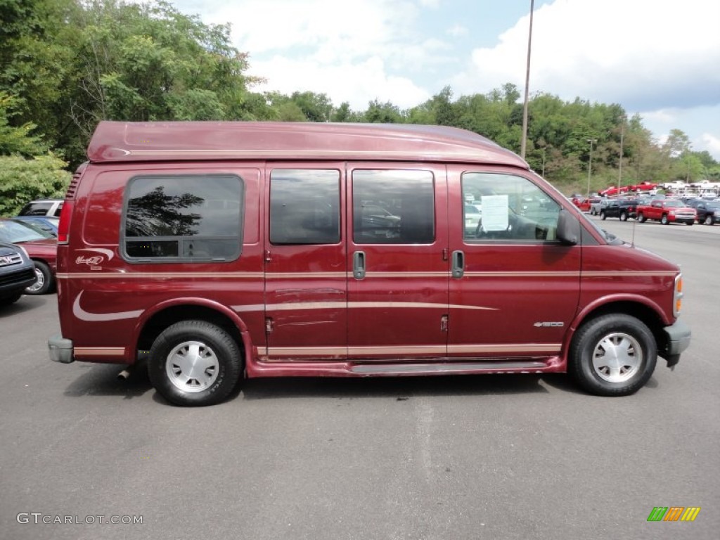 Dark Carmine Red Metallic 1999 Chevrolet Express 1500 Passenger Conversion Van Exterior Photo #53851134