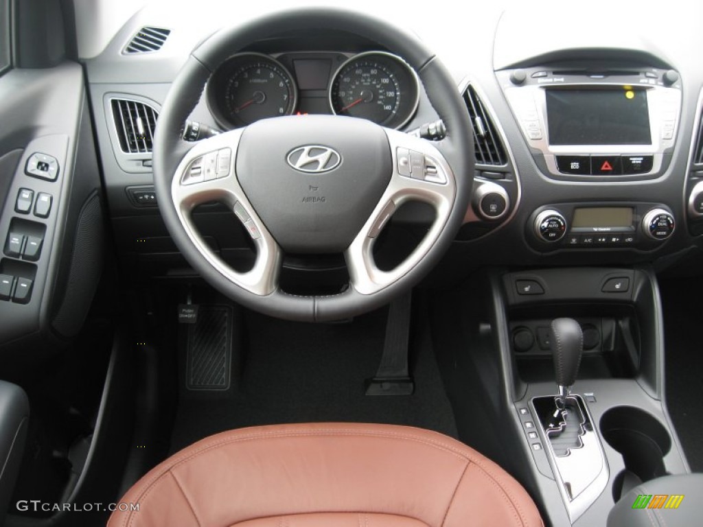 2012 Hyundai Tucson Limited Black/Saddle Steering Wheel Photo #53855328