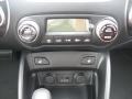 2012 Hyundai Tucson Black/Saddle Interior Controls Photo