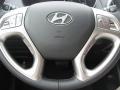 2012 Hyundai Tucson Black/Saddle Interior Steering Wheel Photo