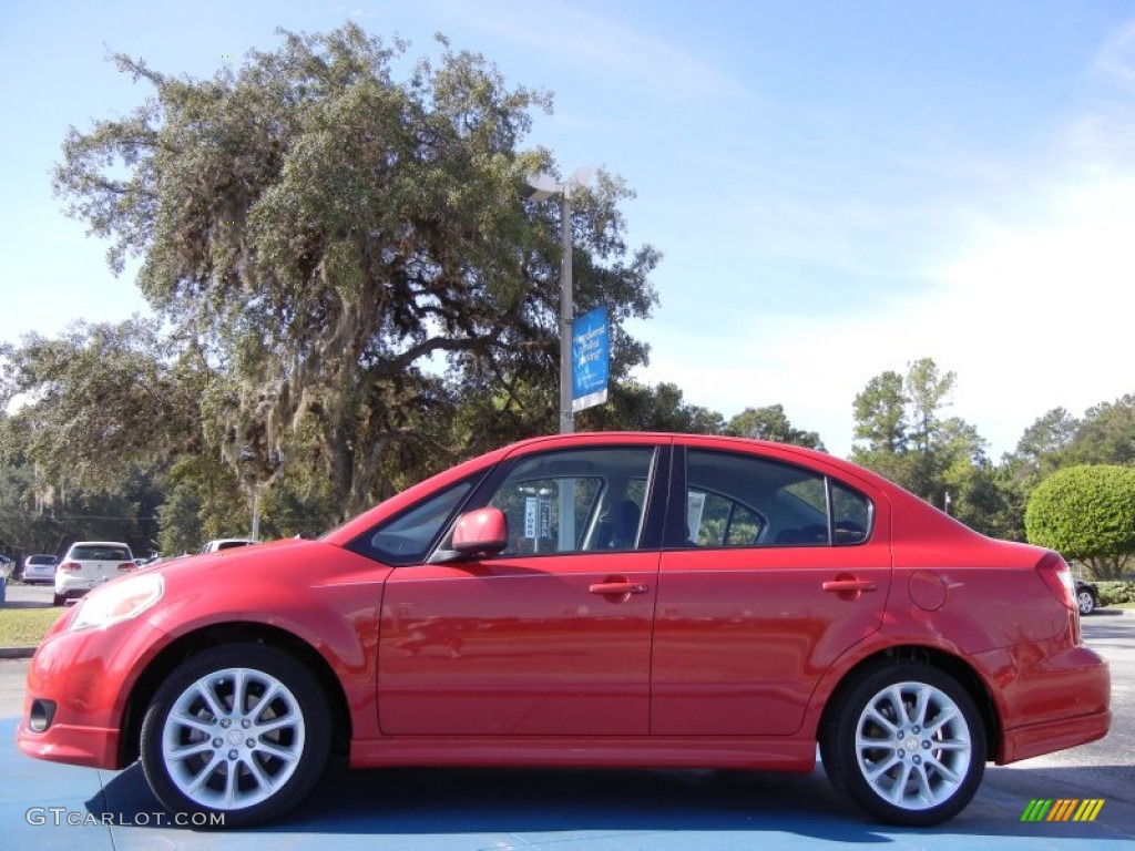 Vivid Red 2009 Suzuki SX4 Sport Sedan Exterior Photo #53859551