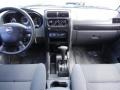 Dashboard of 2004 Frontier XE V6 Crew Cab
