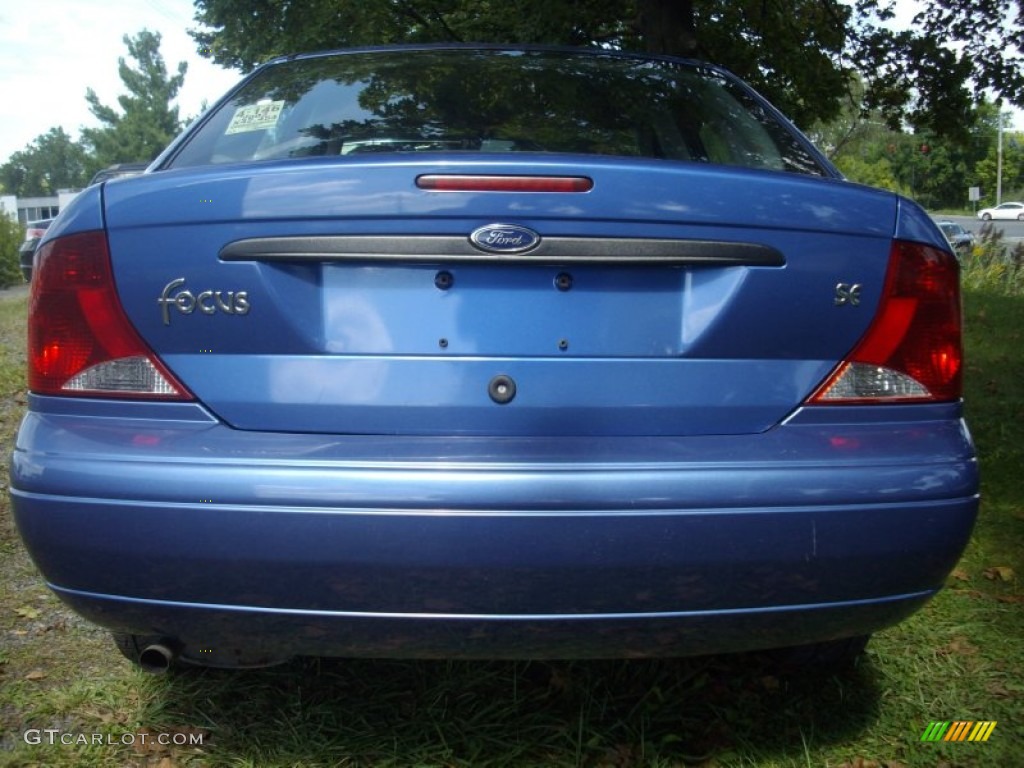 2003 Focus SE Sedan - French Blue Metallic / Medium Graphite photo #5