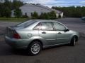 2005 Light Tundra Metallic Ford Focus ZX4 SE Sedan  photo #4