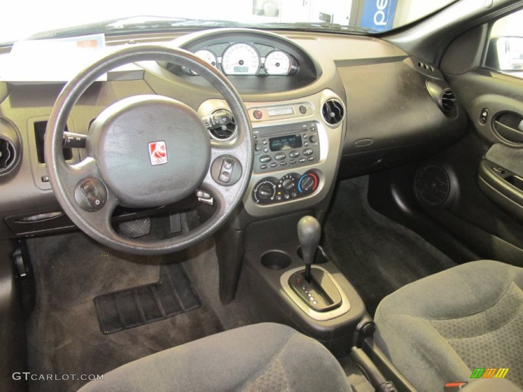 2004 Saturn ION 3 Quad Coupe Black Dashboard Photo #53930554