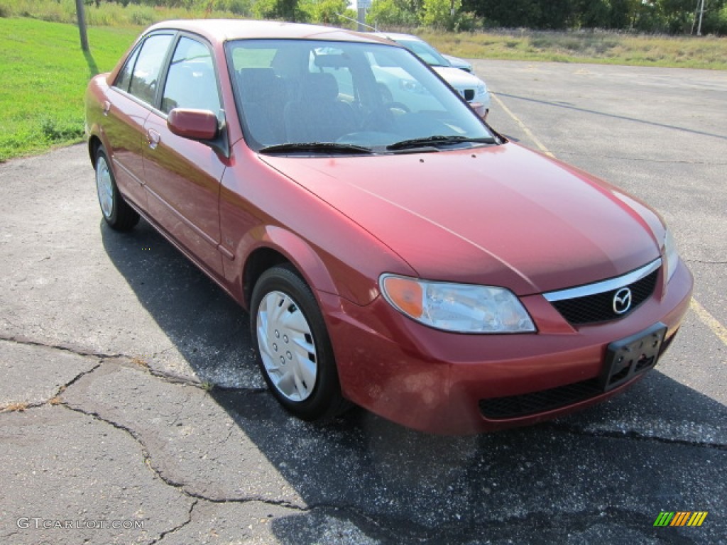 2002 Protege LX - Garnet Red Metallic / Gray photo #7