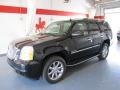 2011 Onyx Black GMC Yukon Denali AWD  photo #1