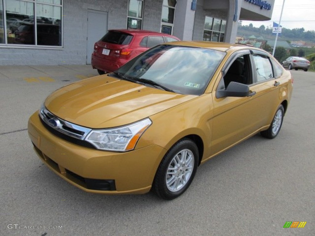 Amber Gold Metallic 2009 Ford Focus SE Sedan Exterior Photo #53973921