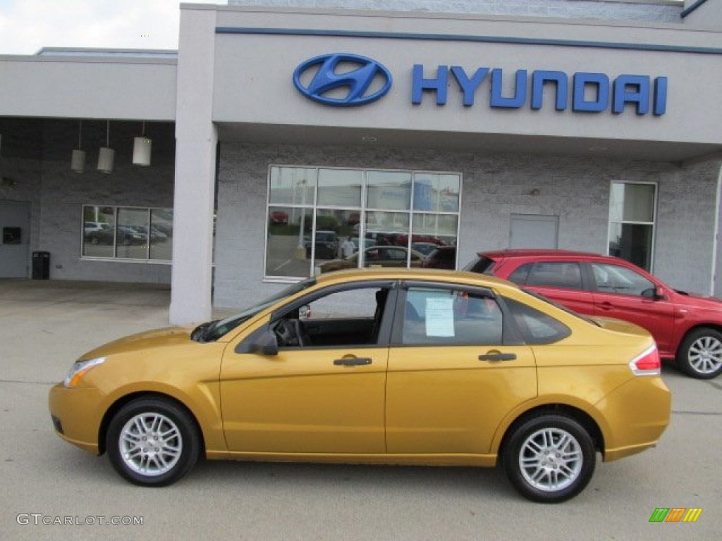 2009 Focus SE Sedan - Amber Gold Metallic / Charcoal Black photo #3