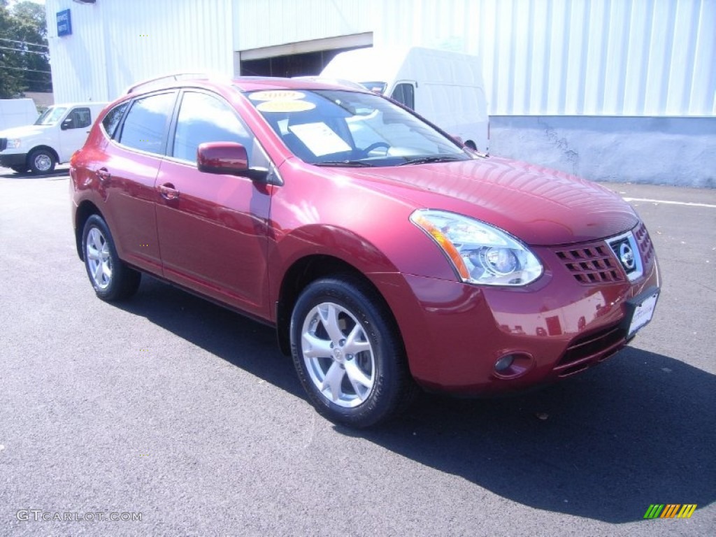 2009 Rogue SL AWD - Venom Red / Black photo #1