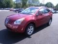 2009 Venom Red Nissan Rogue SL AWD  photo #28