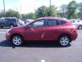 2009 Venom Red Nissan Rogue SL AWD  photo #29