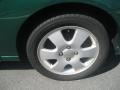 2002 Ford Focus ZX5 Hatchback Wheel and Tire Photo