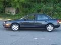 2002 Black Silver Saturn S Series SL2 Sedan  photo #2