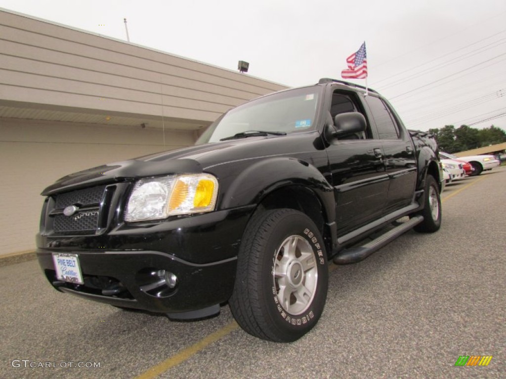 2004 Explorer Sport Trac XLT 4x4 - Black Clearcoat / Medium Dark Flint/Dark Flint photo #1