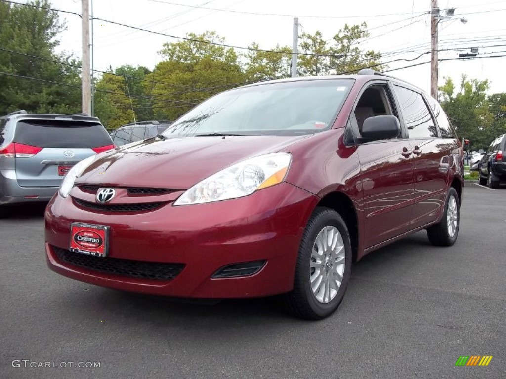 2009 Sienna LE AWD - Salsa Red Pearl / Taupe photo #1