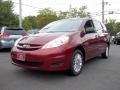 Salsa Red Pearl 2009 Toyota Sienna LE AWD