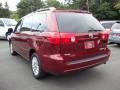 2009 Salsa Red Pearl Toyota Sienna LE AWD  photo #7
