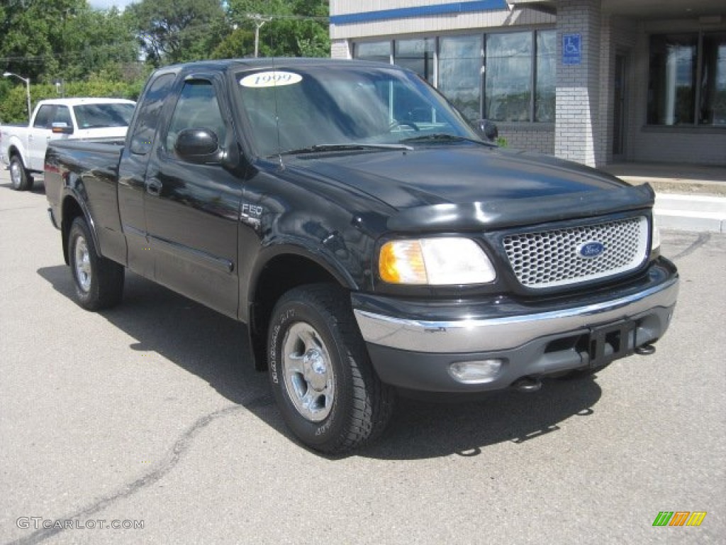 1999 F150 XLT Extended Cab 4x4 - Black / Medium Graphite photo #1