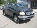 1999 Black Ford F150 XLT Extended Cab 4x4  photo #1