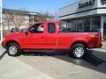 2001 Bright Red Ford F150 XLT SuperCab 4x4  photo #7