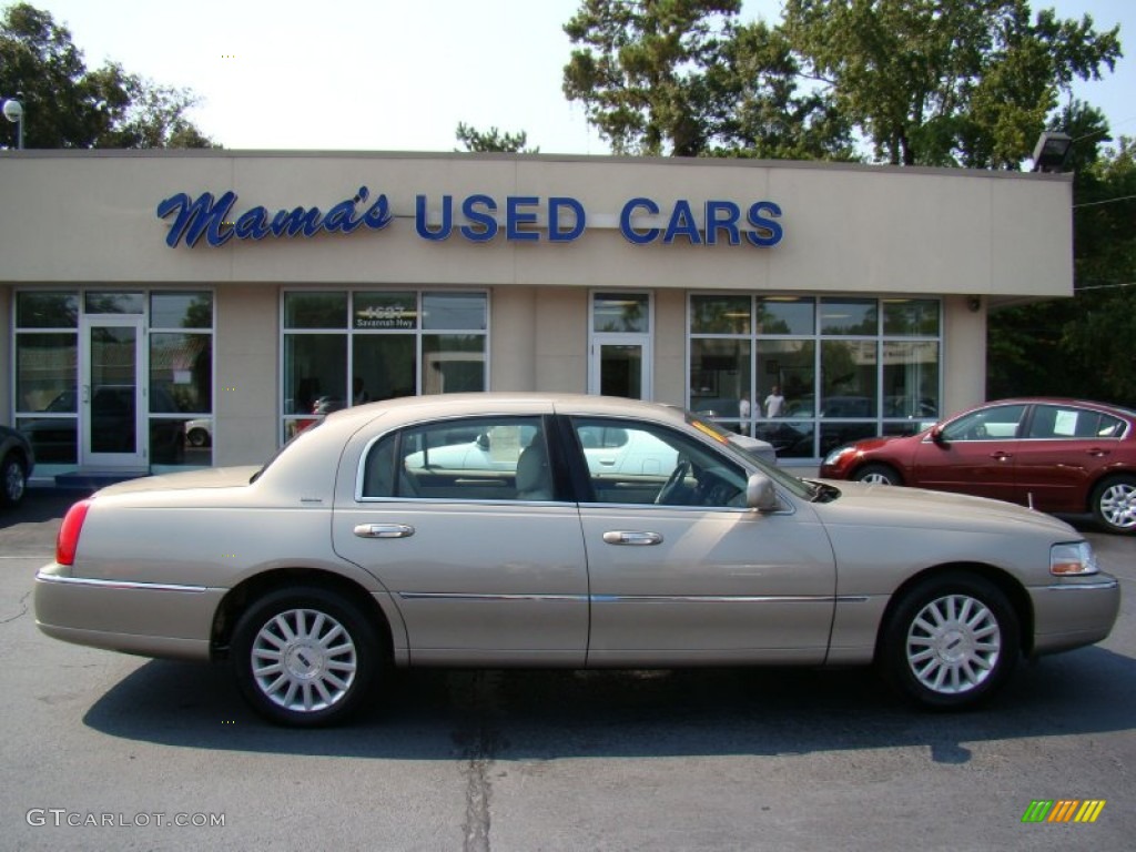 Pueblo Gold Metallic Lincoln Town Car