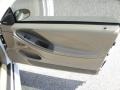 Medium Parchment Door Panel Photo for 2004 Ford Mustang #54120477