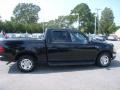 2002 Black Ford F150 XLT SuperCrew  photo #7