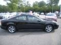 2004 Black Pontiac Grand Prix GTP Sedan  photo #6