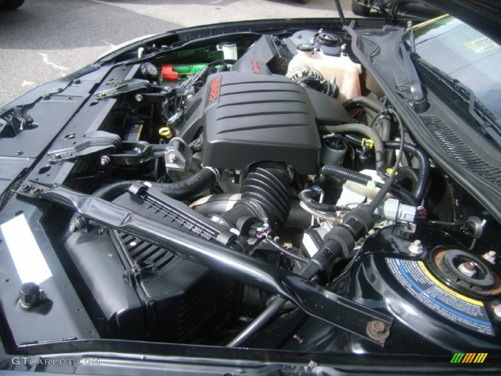 2004 Grand Prix GTP Sedan - Black / Dark Taupe photo #24