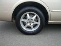 1998 Nissan Maxima GXE Wheel and Tire Photo