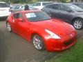 2009 Solid Red Nissan 370Z Touring Coupe  photo #2