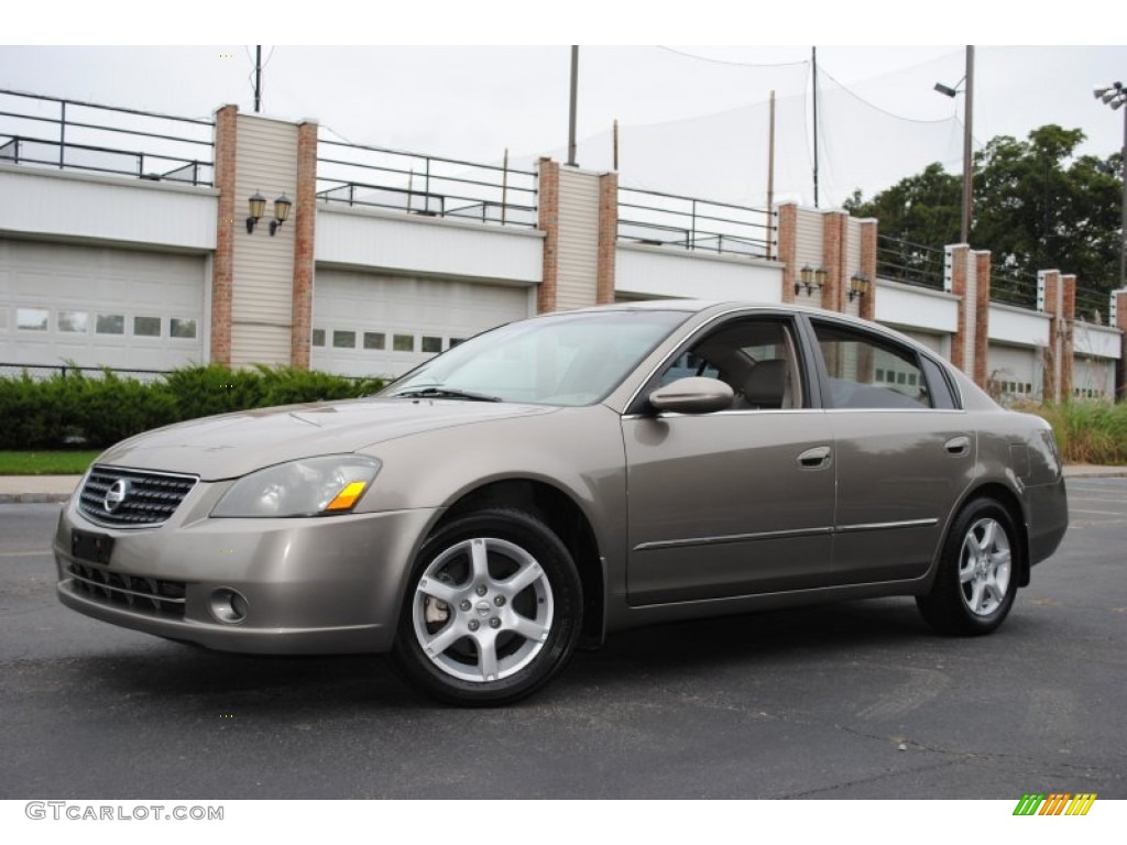 Coral Sand Metallic Nissan Altima