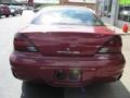 2004 Sport Red Metallic Pontiac Grand Am SE Sedan  photo #14