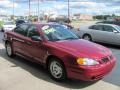 2004 Sport Red Metallic Pontiac Grand Am SE Sedan  photo #19