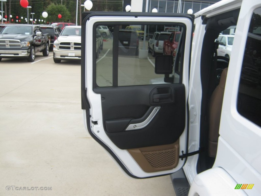 2012 Jeep Wrangler Unlimited Sahara 4x4 Black/Dark Saddle Door Panel Photo #54307113