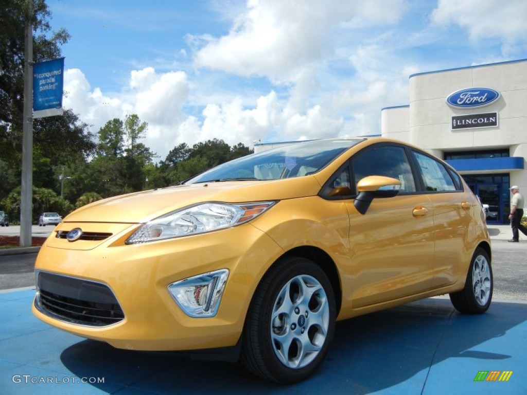 2011 Fiesta SES Hatchback - Yellow Blaze Metallic Tri-Coat / Charcoal Black/Blue Cloth photo #1