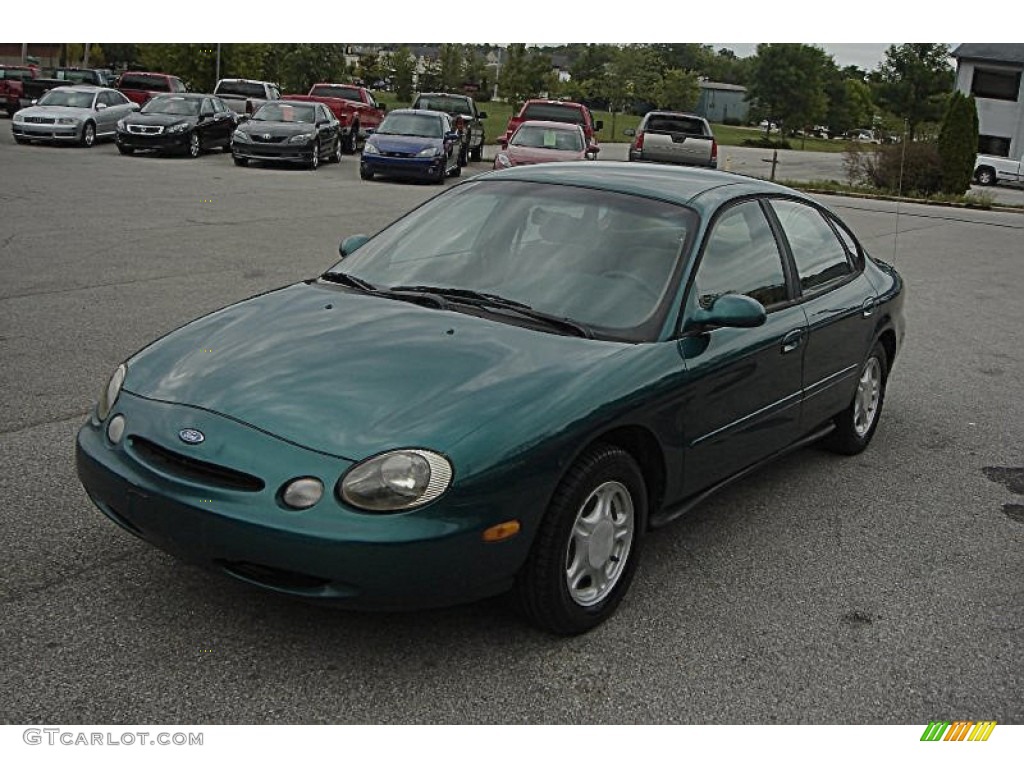 Pacific Green Metallic Ford Taurus