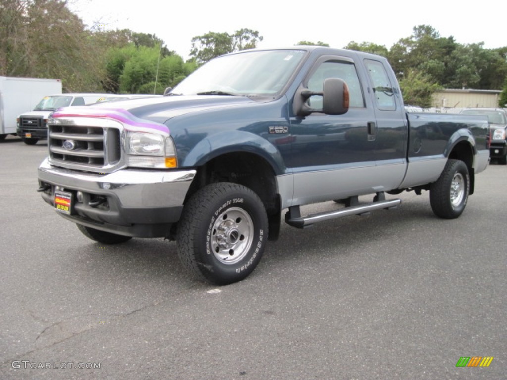 2004 F250 Super Duty XLT SuperCab 4x4 - Medium Wedgewood Blue Metallic / Medium Flint photo #1