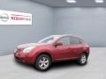 2009 Venom Red Nissan Rogue SL  photo #1