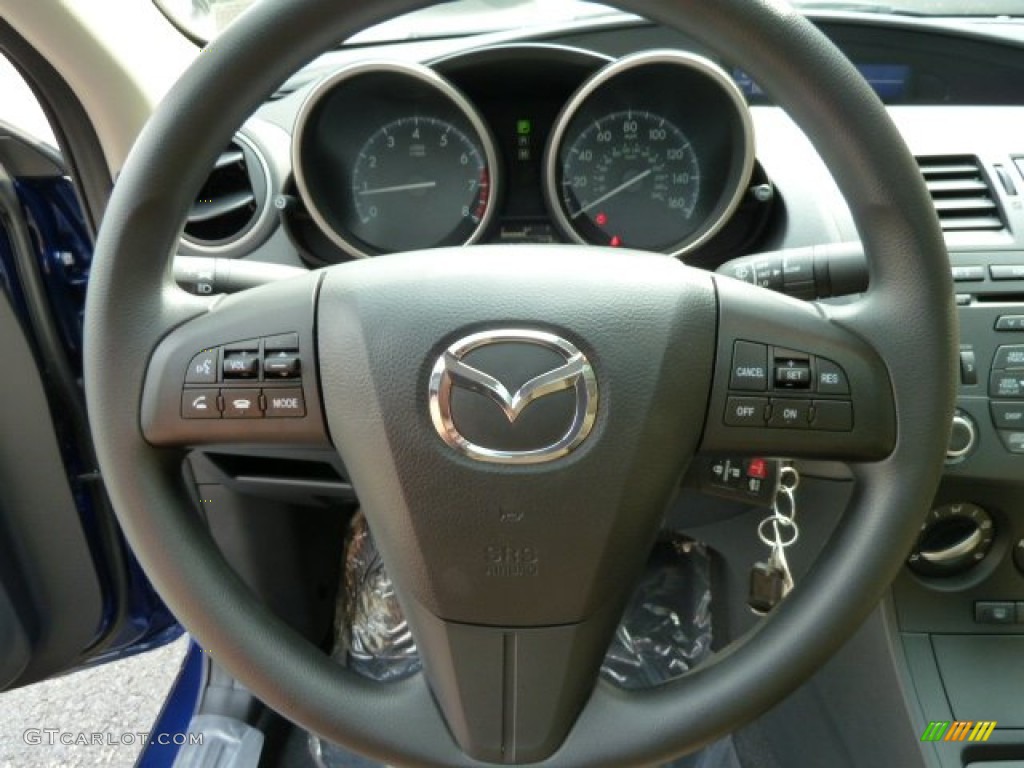 2012 Mazda MAZDA3 i Sport 4 Door Dune Beige Steering Wheel Photo #54463365