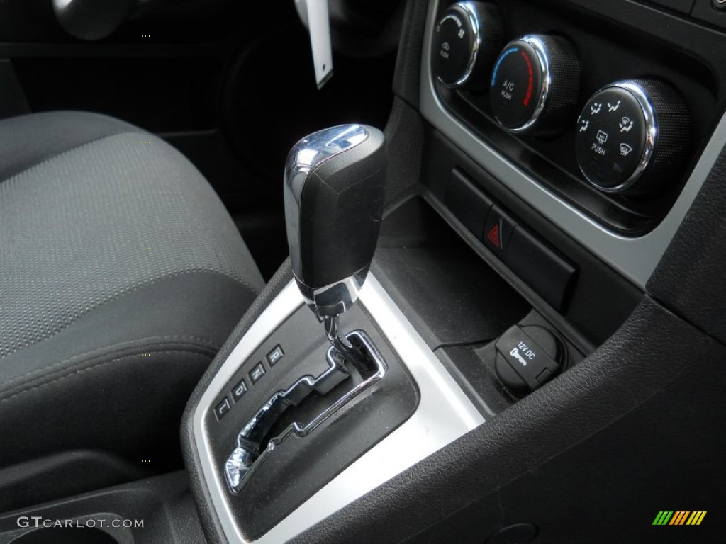 2010 Caliber SXT - Optic Green Metallic / Dark Slate Gray photo #17