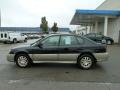 2001 Black Granite Pearlcoat Subaru Outback Limited Sedan  photo #2