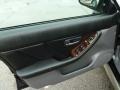 Black 2001 Subaru Outback Limited Sedan Door Panel