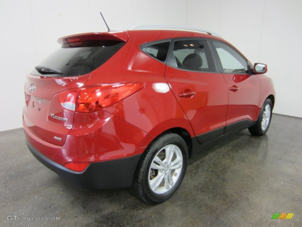 Garnet Red 2010 Hyundai Tucson GLS AWD Exterior Photo #54502187