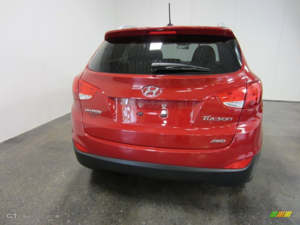 Garnet Red 2010 Hyundai Tucson GLS AWD Exterior Photo #54502194