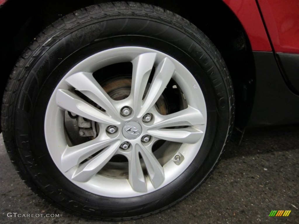 2010 Tucson GLS AWD - Garnet Red / Taupe photo #16