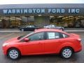 2012 Race Red Ford Focus SE Sedan  photo #1