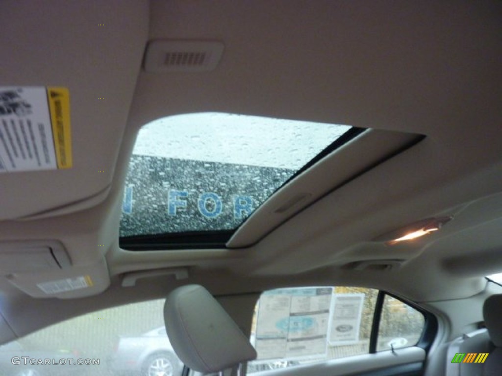 2012 Taurus SEL - Red Candy Metallic / Light Stone photo #16